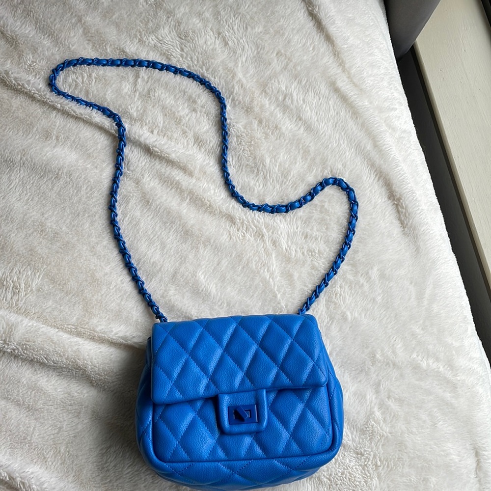 Blue quilted cross body bag